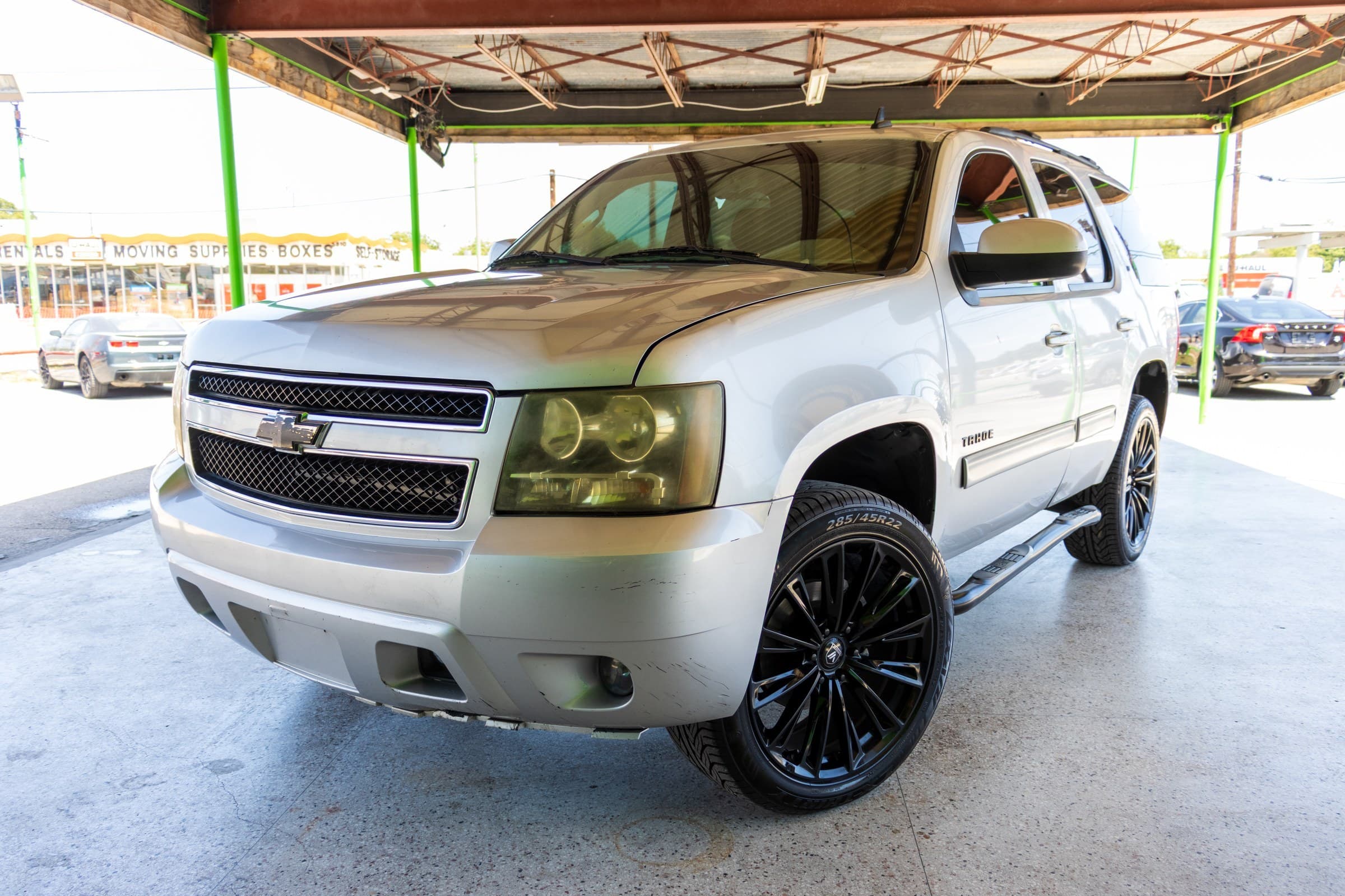 2011 Chevrolet Tahoe LT in white, front three-quarter view