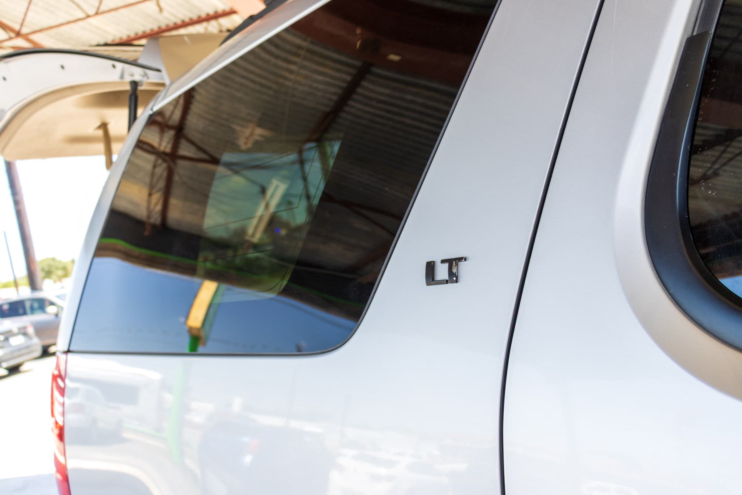 2011 Chevrolet Tahoe LT, LT badge on rear quarter window