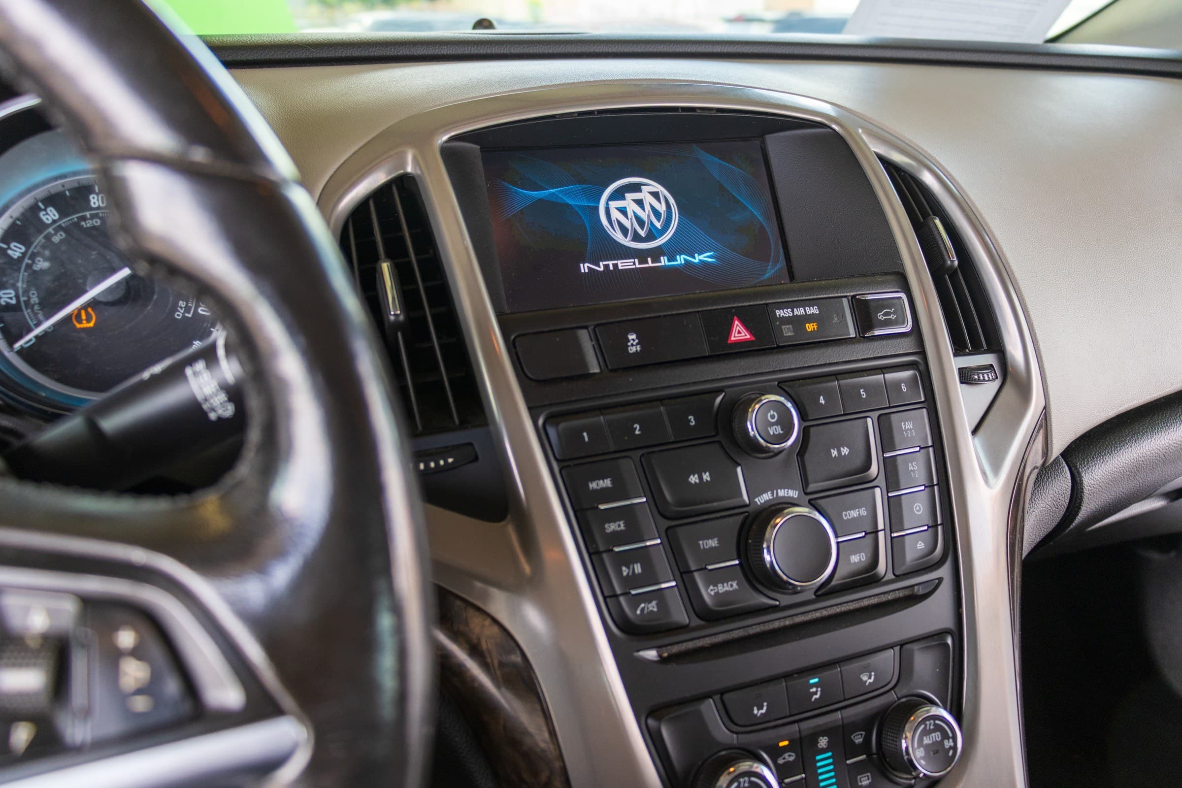 The Verano's centre stack, with the Buick IntelliLink display screen above the radio controls.